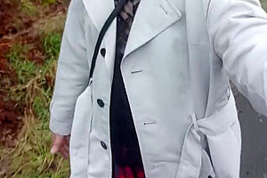Crossdresser Takes A Walk On A Windy Lane