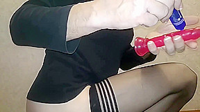Crossdresser having fun with his dildo