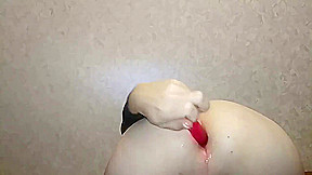 Crossdresser having fun with his dildo