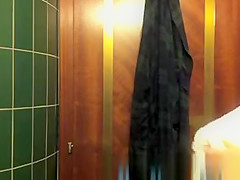 Cute girl changing in bathroom