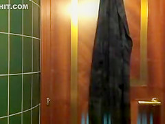Cute girl changing in bathroom
