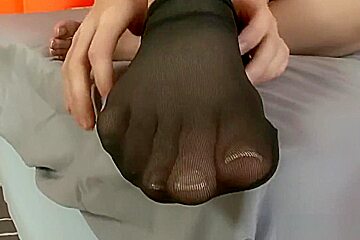 Elle Alexandra's barefeet in stockings