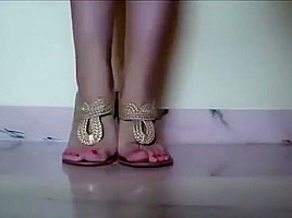Energetic Woman Dancing Around in Her Sexy Sandals