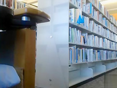 Female student 18+ makes upskirt selfie in library