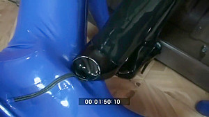 Femdom Girl In Black Latex Makes Heeljob And Piss An Her Rubber Male Slave