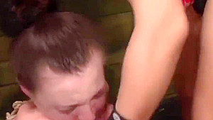 Femdom dyke punishes bonded sub with huge strapon