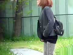 Fetish asian slut peeing in street