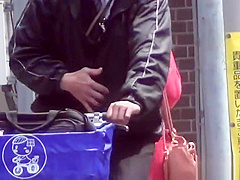 Fetish asian slut peeing in street