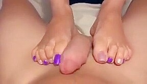 Footjob while TV