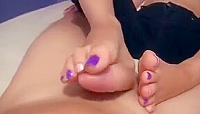 Footjob while TV