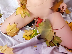 Fucks Herself With A Phallus On Autumn Foliage