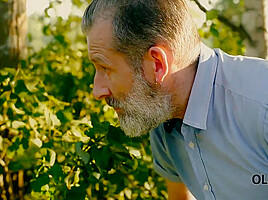 Girl Tempts Old Man And Gets It On With Him In The Greenery