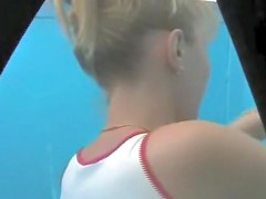 Girl in beach cabin and her erotic white lace panty