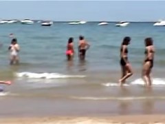 Girls in candid black bikinis spied on the crowded beach 07d
