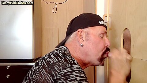 Gloryhole BJ loving gaydaddy sucks cock in amateur video