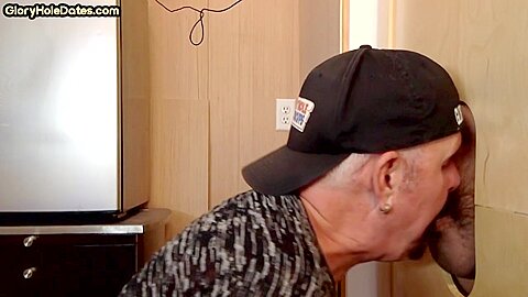 Gloryhole BJ loving gaydaddy sucks cock in amateur video