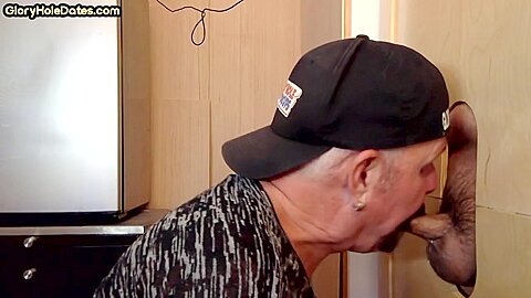 Gloryhole BJ loving gaydaddy sucks cock in amateur video