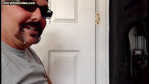 Gloryhole DILF sucks cock and swallows cum in amateur video