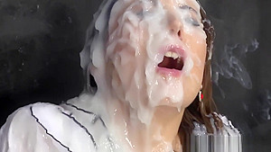 Gloryhole slut rubs cunt