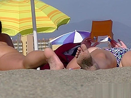 Great looking nudist chicks with big tits spreading their le