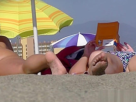 Great looking nudist chicks with big tits spreading their le