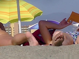 Great looking nudist chicks with big tits spreading their le