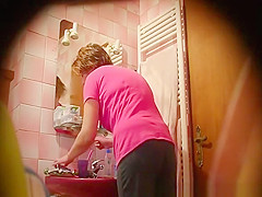 Hairy woman spied in bathroom