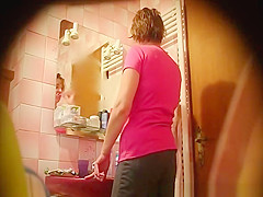 Hairy woman spied in bathroom