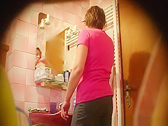 Hairy woman spied in bathroom