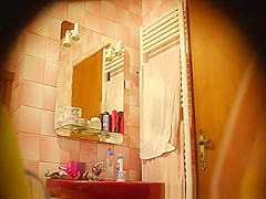 Hairy woman spied in bathroom