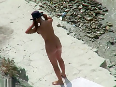 Horny couple on the beach
