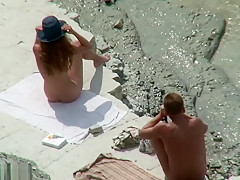 Horny couple on the beach