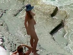 Horny couple on the beach