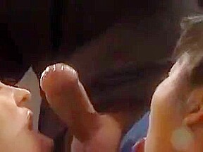 Horny young Asian and blonde suck on a hard cock then get fucked