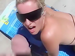 Hot blonde gets glazed at the beach
