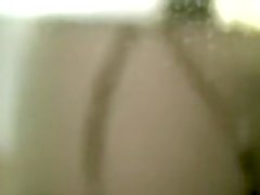 Hot looking Asian spied shaving between her slender legs