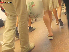 Hot upskirts of adorable girl with beautiful hair-style
