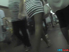 Hot upskirts of adorable girl with beautiful hair-style
