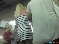 Hot upskirts of adorable girl with beautiful hair-style