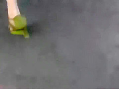 Hypnotic ass under a short white skirt