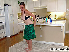 In the kitchen, Lindsay masturbates and plays alone