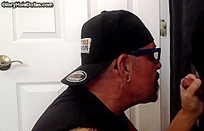 Inked arm gloryhole DILF sucks BFs hard cock at home