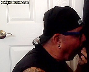 Inked arm gloryhole DILF sucks BFs hard cock at home