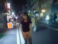 Japanese doll masturbates in public for a crowd