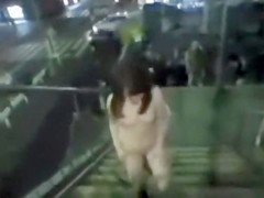 Japanese doll masturbates in public for a crowd