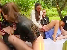 Lez Group Pissing Outside With Dildo Play