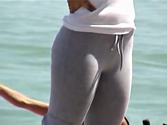 Long haired cutie with big candid ass spied on the beach 01zr