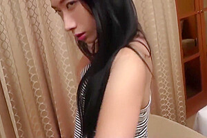 Long-haired Ladyboy In Light Blue Dress Teases With Her Natural Tits