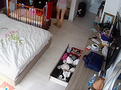 MILF with nice body in her bedroom exposed to ip camera