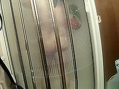 Mature wife spied by her husband in bathroom